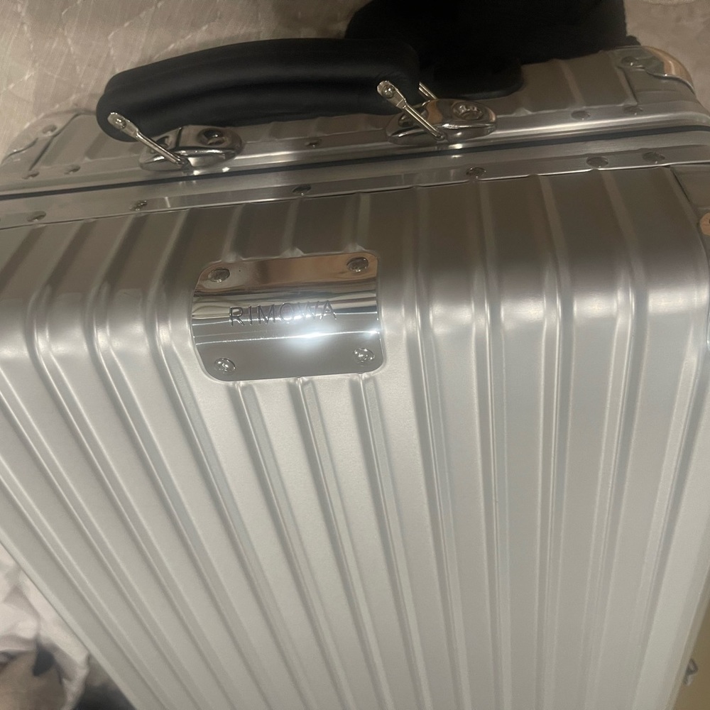 Rimowa cabin aluminum carry on used 2x has all tags dust bag etc very impressive